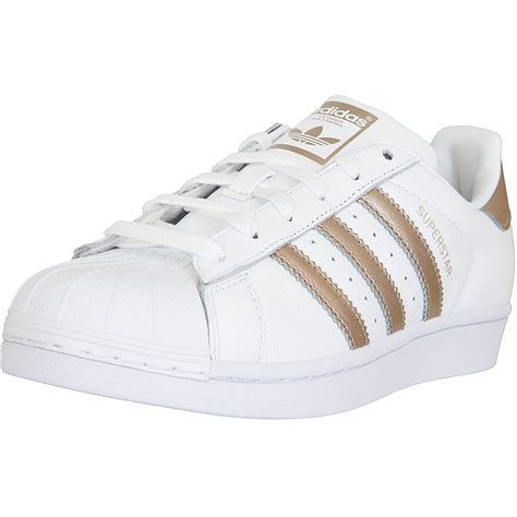 weiße gold adidas superstar|Adidas Superstar sneakers.